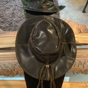 Unisex size Medium Brown Leather Cowboy Hat.